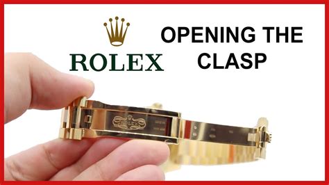 how to open Rolex clasp